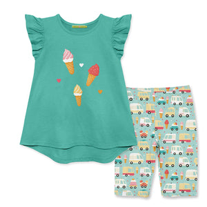 Children's outfit with jade top with ice cream cone pattern and matching bike shorts on a white background