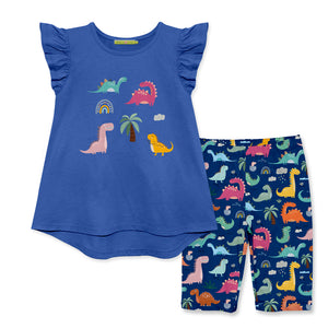 Children's outfit with blue top and dinosaur-patterned bike shorts on a white background