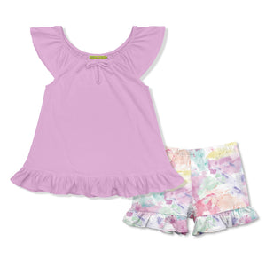 Children's outfit with purple top and floral shorts on a white background