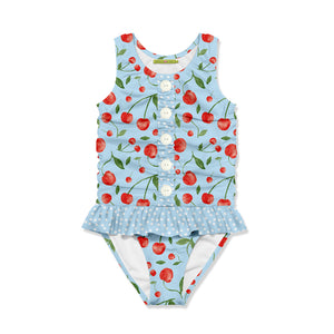 Girls 1-pc ice blue cherries ruffle front swimsuit on a white back ground, front.