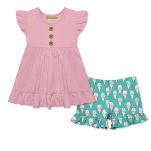 Girls pink top with ruffle detail and matching ice cream cones themed shorts on a white background , front.