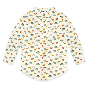 A long-sleeve button front shirt for kids, featuring an all-over dinosaur print on an off-white background. The shirt includes a classic collar, button front, and is decorated with various colorful dinosaurs in yellow, green, and blue, front
