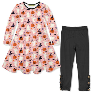 A children's two-piece outfit set featuring a long-sleeve pink dress with a Halloween print of ghosts, pumpkins, and witches hats, paired with charcoal leggings with decorative ruffle & button details at the ankles.
