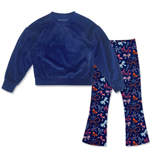 A two-piece children's solid ribbed velour top and leggings featuring bow print pattern pattern.