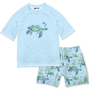Boys rash guard swim set with turtle design on a light blue background, front
