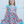 Young girl wearing a  Turquoise  Floral Angel Sleeve Dress and turquoise hair bow standing in front of a white background, front-Millieloveslily.com