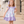 A young girl standing outside wearing a White & Purple Ocean animal themed Square Neck Angel Sleeve Dress - Millieloveslily.com