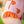 closeup of girl wearing an Orange Gingham Ruffle - Accent One - Piece  swimsuit lifestyle, side- Millieloveslily.com