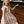 Young girl wearing a blue rodeo themed   Dress standing at a metal fence, lifestyle, front - Millieloveslily.com