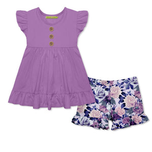 girls purple top and floral short set with ruffle details on a white background, front