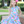 Young girl wearing a  Turquoise Floral Angel Sleeve Dress & Short Set  standing outside, lifestyle,front- Millieloveslily.com