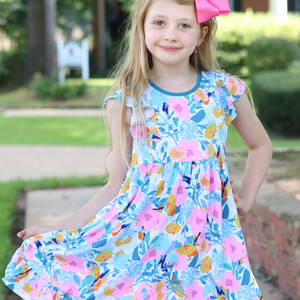 Young girl wearing a  Turquoise Floral Angel Sleeve Dress & Short Set  standing outside, lifestyle,front- Millieloveslily.com